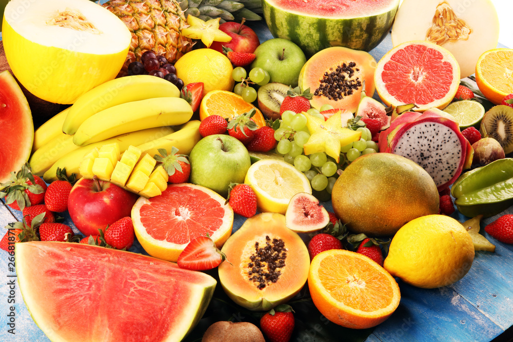 Naklejka Tropical fruits background, many colorful ripe fresh tropical fruits