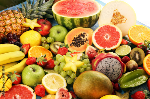 Tropical fruits background  many colorful ripe fresh tropical fruits