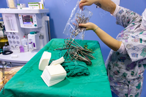 Opening of surgical sterile material before a dog surgery