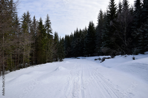 Snow mountain path. Mountain winter track. Winter landscape.