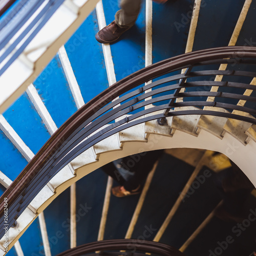 Old blue spiral staircase, spiral stairway inside an old house on Pozsonyi street in Budapest, Hungary. Project Budapest 100 photo