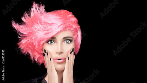 Fashion model girl with stylish pink hair. Beauty salon hair coloring concept...