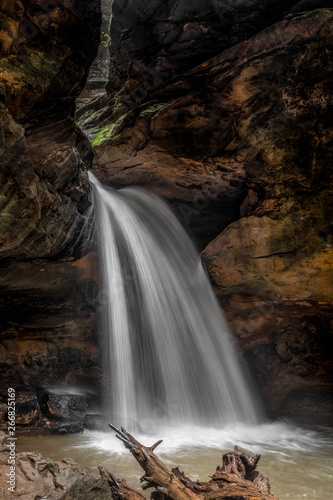 Fototapeta Naklejka Na Ścianę i Meble -  End of the Trail Waterfall - The beautiful waterfall found at the end of the hike into Conkle’s Hollow, in the Hocking Hills of Ohio, flows full during spring rains.