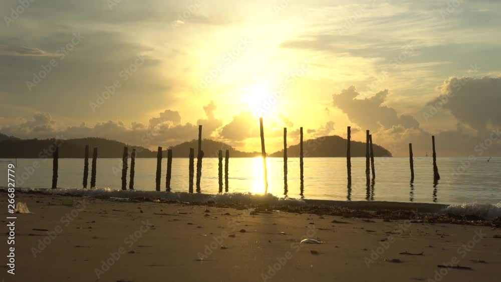 Morning sunrise in summer Golden light, sea water Beautiful sparkle. 4K UHD Video clip Morning sunrise in summer Golden light, sea water Beautiful sparkle. 4K UHD Video clip