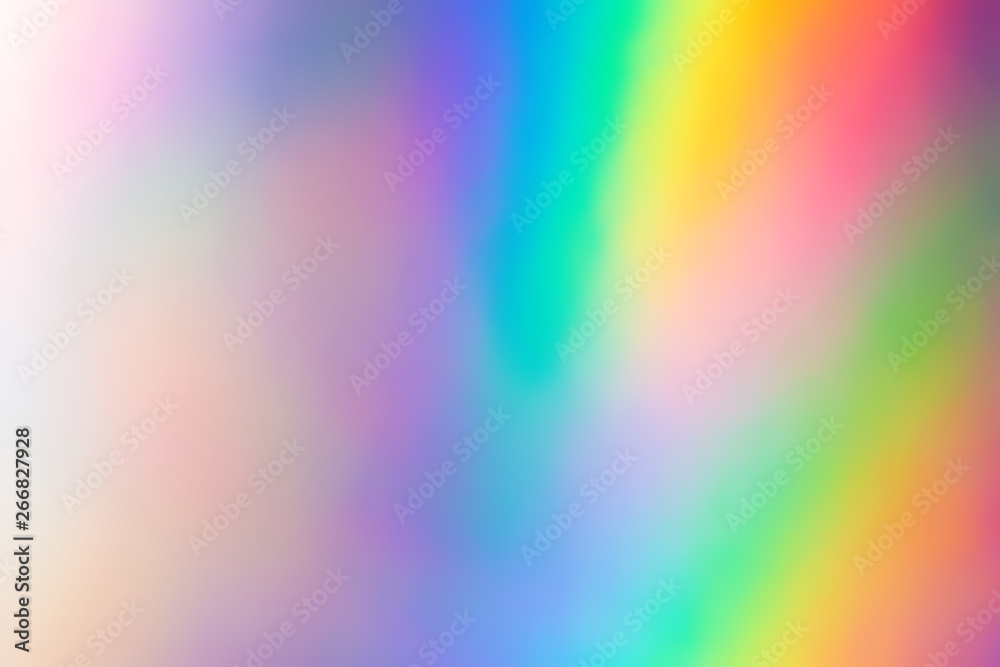 Blurry abstract iridescent holographic foil background.