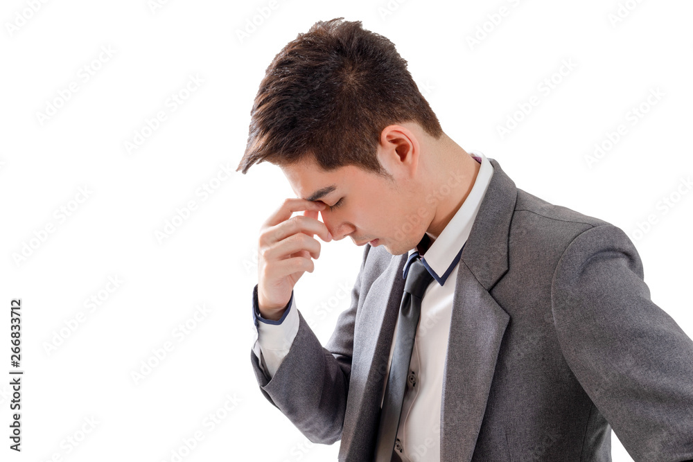 Happy young businessman in office feeling tired and stressed on white background, isolated concept Happy young businessman in office feeling tired and stressed on white background, isolated concept