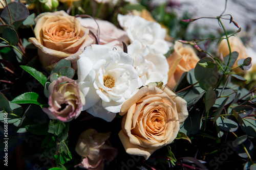 macro close up of wedding bouquet, flowers, roses and greenery in neutral colors