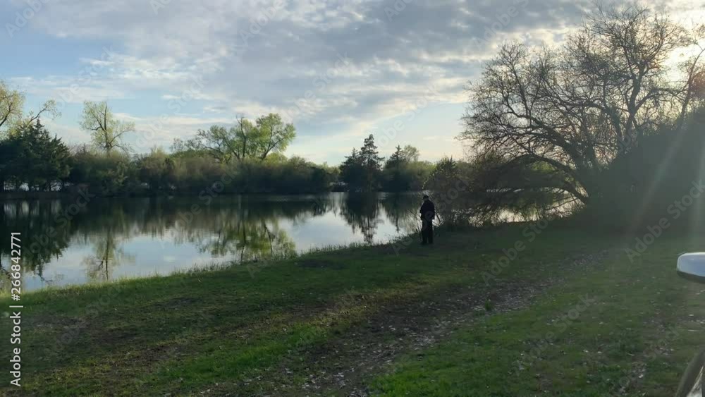 Shot of lakes with wildlife and fisherman, during golden hour and sunset. Shot of lakes with wildlife and fisherman, during golden hour and sunset.