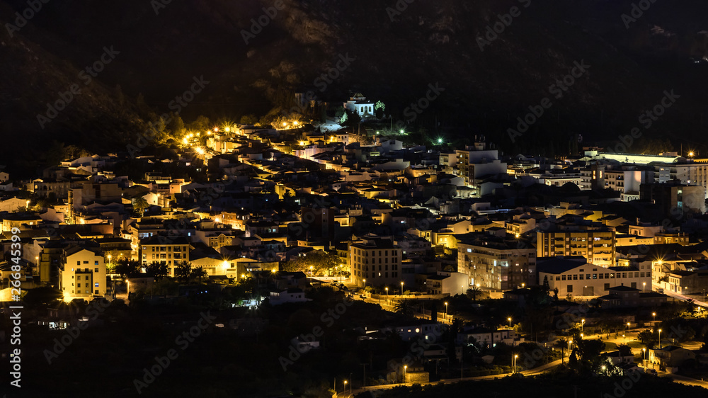 The Spanish town of Pedrequer photographed at night from above.