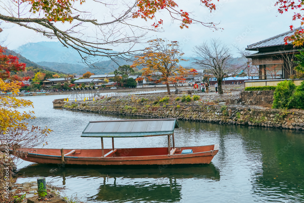 Beautiful the river and boat  in Arashiyama Kyoto Japan in autumn season .