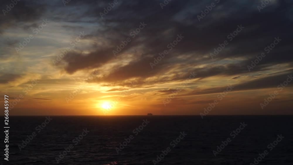Ship cruising on sunset in the mediterranean sea. Realtime video Ship cruising on sunset in the mediterranean sea. Realtime video