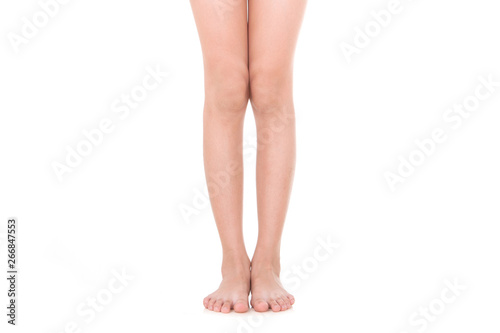 Girl leg gestures isolated over the white background.