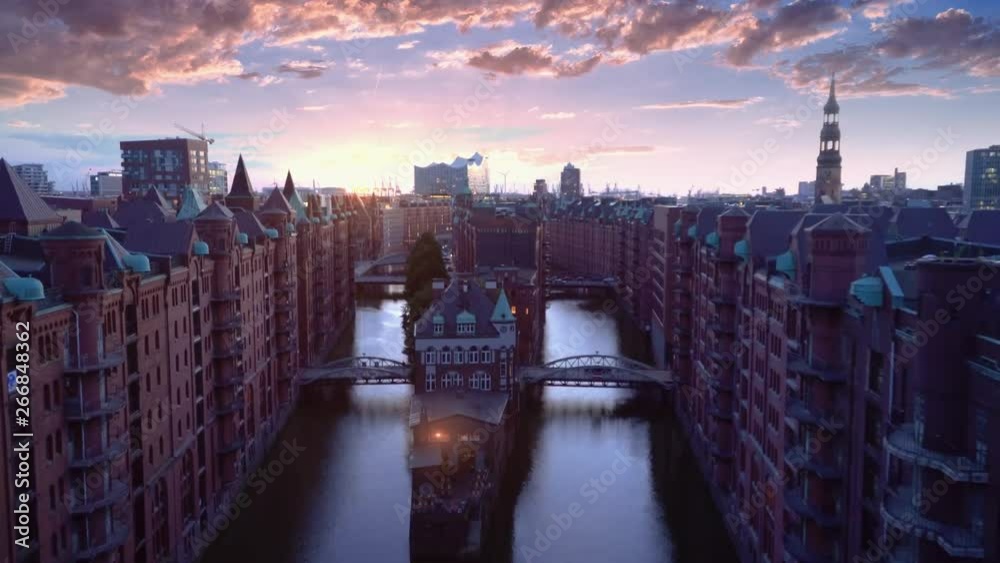 Speicherstadt at sunset drone shot, drone moving through Speicherstadt. beautiful sunset at Speicherstadt
