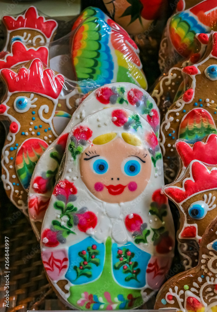 Ornate pryaniki, Russian honey spice cookies, shaped like matryoshka dolls at a grocery store in Saint Petersburg Russia