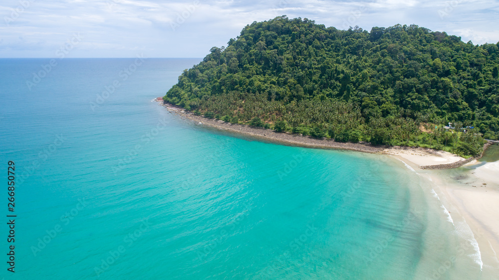 Beautiful Aerial view by drone flying above beach and sea with coconut palm tree in paradise tropical Kud island at Thailand, vacation and travel concept 