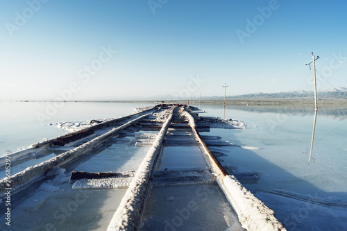 Railway tracks in chaka salt lake © xu