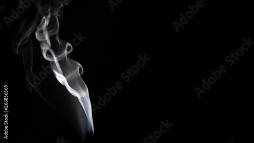 Footage of the flowing smoke on the black background. 100 FPS for slow Motion