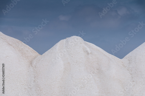 hills of produced salt in a seawater saline photo