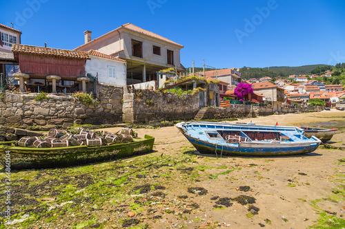Combarro, Spain. Picturesque landscape with fishing boats and traditional horreo barn