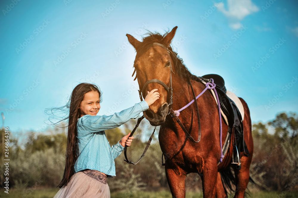 Beautiful girl with horse on the grass. Friendship concept. Beautiful girl with horse on the grass. Friendship concept.