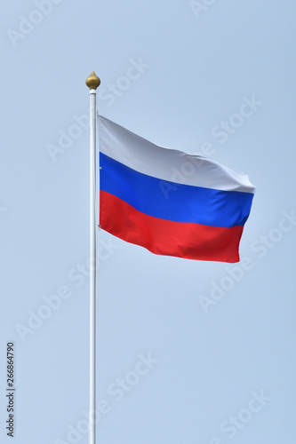 Free Download Beautiful and bright flag of the Russian Federation against the sky. - GFXLoad