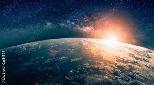 Fototapeta Naklejka Na Ścianę i Meble -  Landscape with Milky way galaxy. Sunrise and Earth view from space with Milky way galaxy. (Elements of this image furnished by NASA)