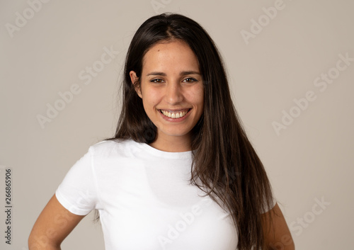 Portrait of young attractive cheerful woman with smiling happy face. Human expressions and emotions