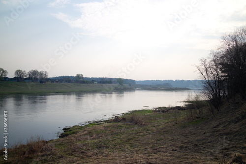Fototapeta Naklejka Na Ścianę i Meble -  landscape, spring river in the morning and evening