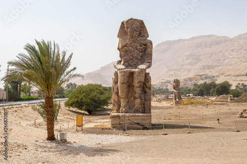 A massive statue of Amenhotep III on the west bank of the Nile, Luxor, Egypt