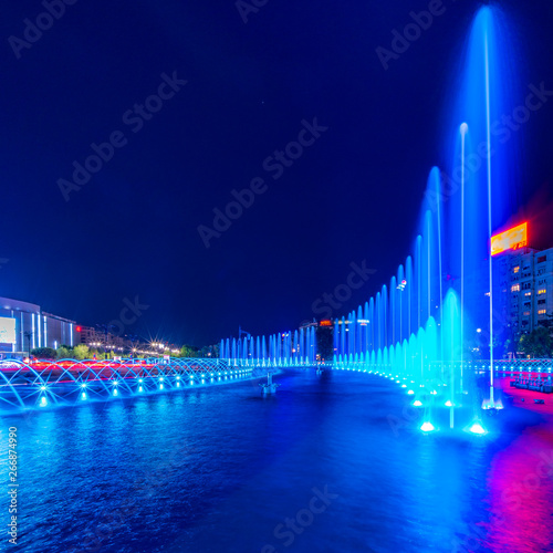 Spectacular blue light waterworks in downtown Bucharest square