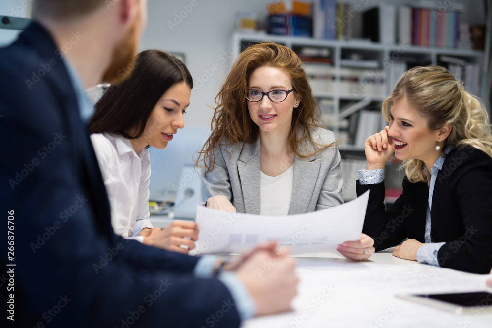 Business people working together on project and brainstorming in office Business people working together on project and brainstorming in office