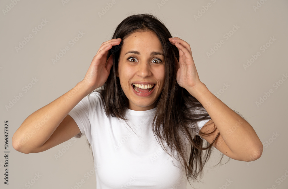 Close up portrait of surprised and happy woman celebrating victory and good news Close up portrait of surprised and happy woman celebrating victory and good news
