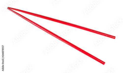 red painted wooden chopsticks isolated