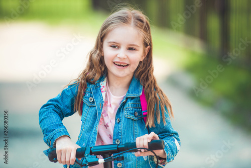 Kid enjoying ride in the park © tan4ikk