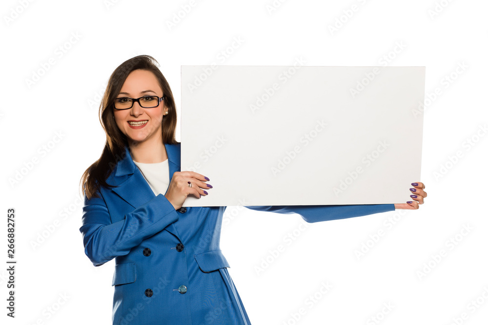 Young smiling business woman holding empty board on white background Young smiling business woman holding empty board on white background