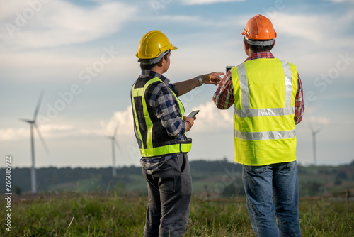 engineer with wind generators power plant construction site