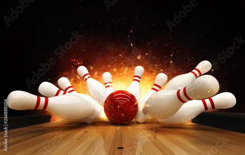 Obraz na plátně Bowling strike hit with fire explosion