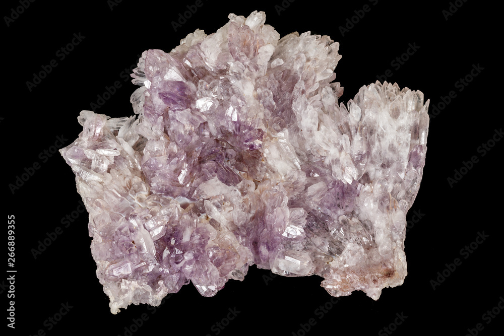 Macro of amethyst mineral stone on black background Macro of amethyst mineral stone on black background