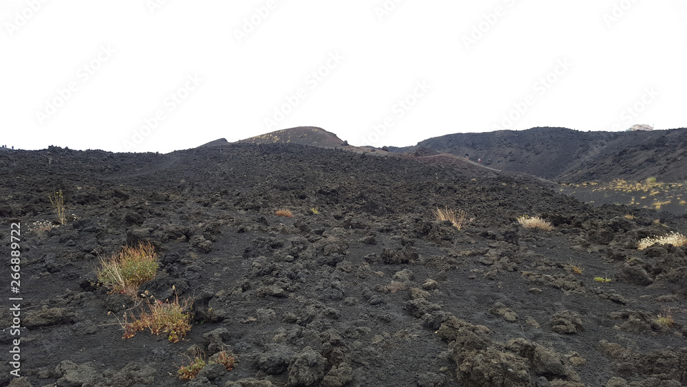 Big dry stones pile on lava cooled Etna Mount