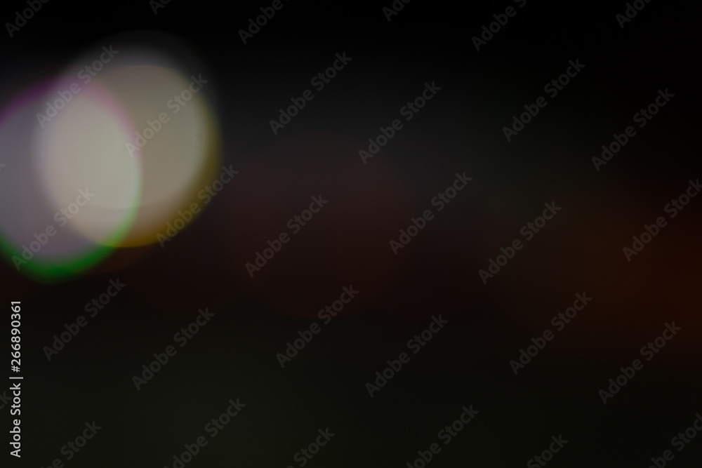 Bokeh on night, abstract background with circles
