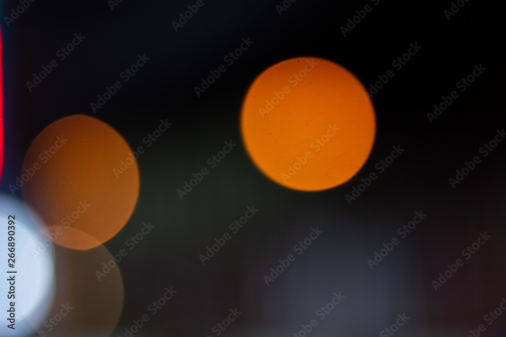 Bokeh on night, abstract background with circles