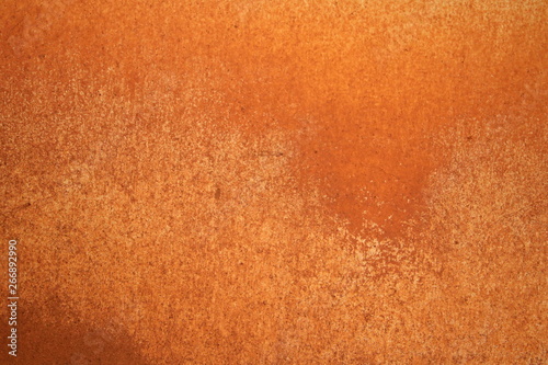 Background of orange mire on the wall