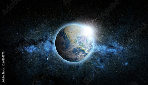 Fototapeta Naklejka Na Ścianę i Meble -  Planet Earth with sunrise on space background. Elements of this image furnished by NASA.
