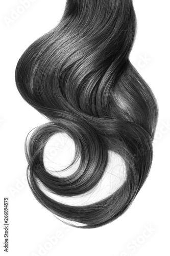 Long wavy black hair on white background. Ponytail