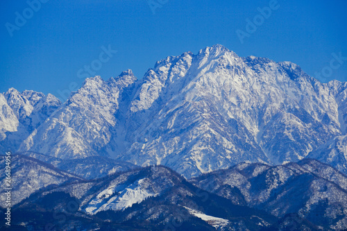 Tateyama Mountain Range seen from Toyama Plain in Japan.  Mt  turugidake.                                                