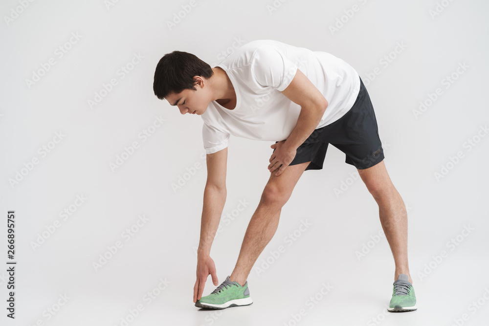 Full length portrait of a healthy fit young sportsman