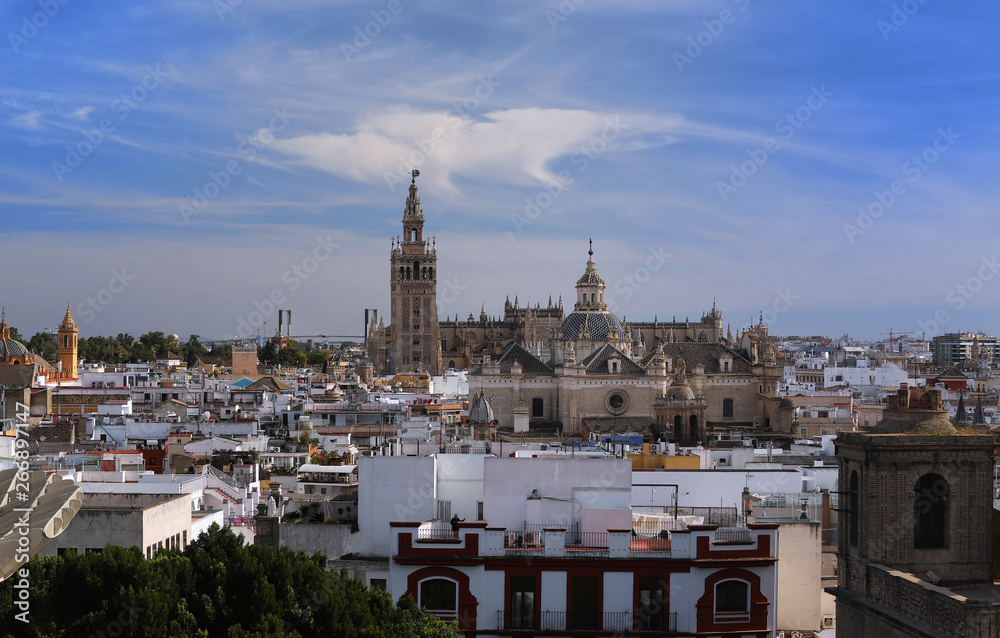 Fototapeta premium Aerial view of the roofs and the cathedral of Seville, Andalusia, Spain.