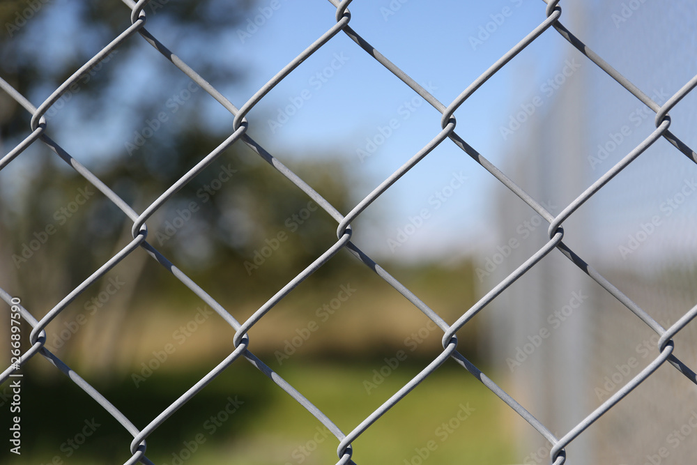Detail of a fence with abstract background. Detail of a fence with abstract background.