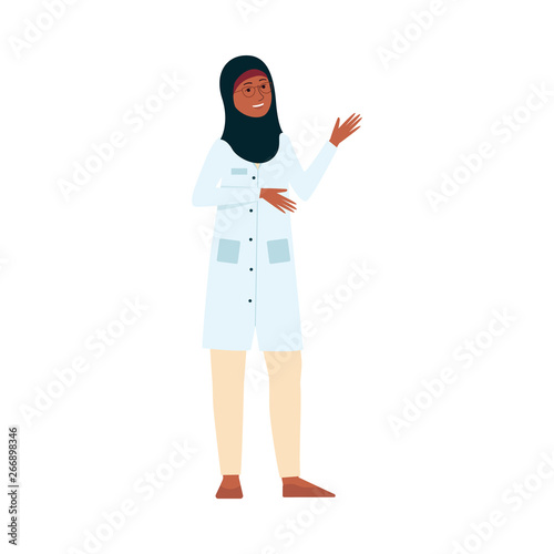 Female doctor or nurse with medical uniform and Muslim hijab smiling and waving © sabelskaya