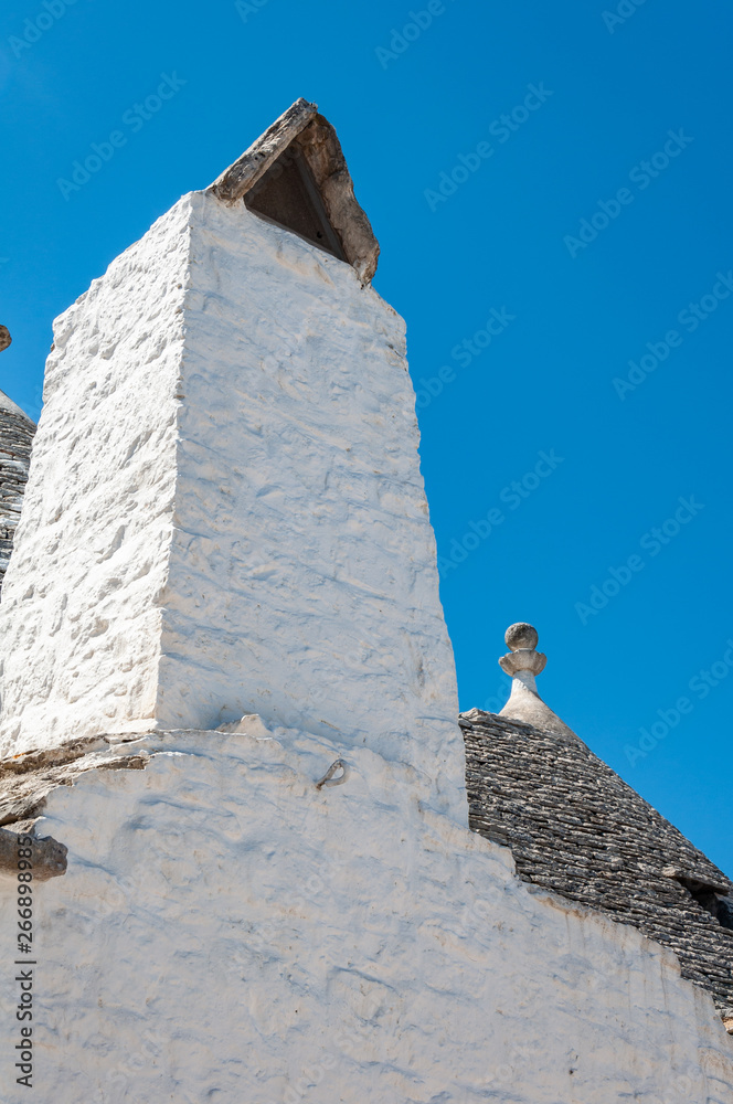 Alberobello, Italy. The picturesque village of trulli. Stone houses built in the typical circular shape with cone roofs.
